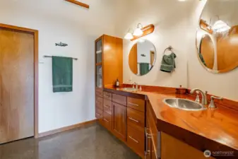 Incredible ensuite with one of a kind design elements and use of rich hardwoods usually reserved for the the most prestigiuos yahts.