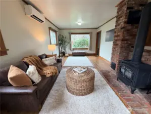 Natural light fill this room from a large picture window plus 3 additional windows.