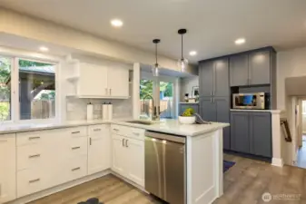Custom cabinetry, coffee garage and pantry.