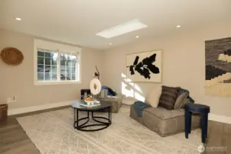 Rec room has space for media or gym