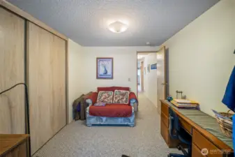 second bedroom leads into sunroom