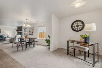 Dining area to the left, a nook to the right - would be great for casual dining or a great spot for a small desk or shelves or sideboard, or ... ?