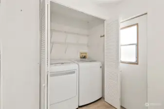 Laundry with storage.