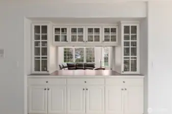 Additional built-in kitchen cabinetry overlooking the family room.