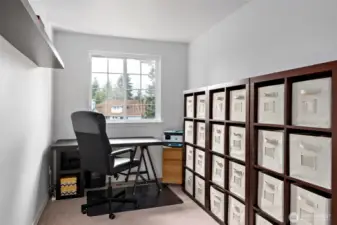 Bonus/flex room in the primary bedroom suite is currently being used as an extra office space.