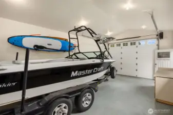 Detached shop/garage has plenty of room for projects, etc.