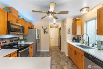 Spacious kitchen with SS appliances that all stay.