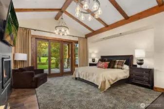 Primary Wing on Main Level, complete with gas fireplace & own terrace.