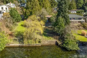 Notice the concrete Bulkhead with stairs leading to the water.