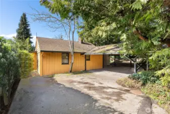 Mid-century home tucked at the end of a private drive, offering privacy and seclusion.