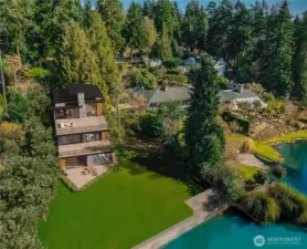 Conceptual digital rendering only. Buyer to verify site plan eligibility and permitted use. Home shown oriented to the northwest to capture stunning lake and sunset views.