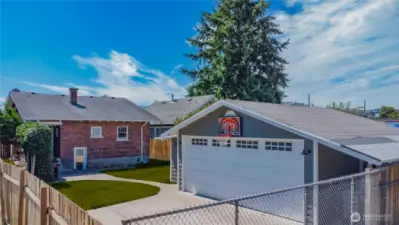Fully fenced back alley access shown here with off-alley parking
