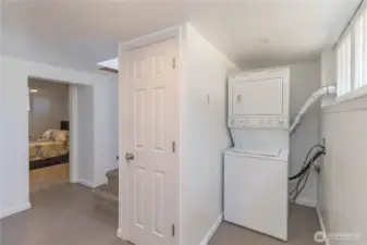 Enter the fully finished basement from the house or separate entrance, featuring laundry and storage.