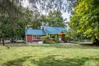 House has been updated with a metal roof, Hardie Plank siding (with baked-in color!), triple-pane windows, updated plumbing and updated electrical panel & wiring.