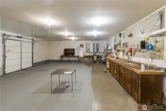 Huge shop includes a pellet stove plus another roll-up door for access to the back field/orchard