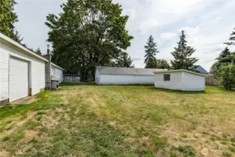 Behind the garage & barn