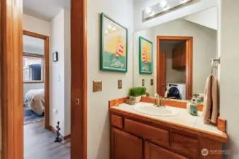 !/2 bath on the lower level of the tri-level home.