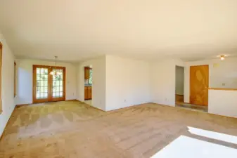 Living room and dining area with French doors