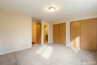 Primary Bedroom with brand new carpet and en suite bathroom