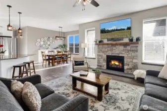 Spacious and bright, the open living room flows effortlessly into the main living areas, creating a welcoming space that feels both expansive and connected.