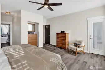 Additional touches in the primary suite include a niche for the chest and a ceiling fan.