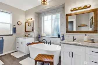 Your private retreat...twin Nevaska  granite slabbed vanities in this sundrenched space accommodate the morning rush!