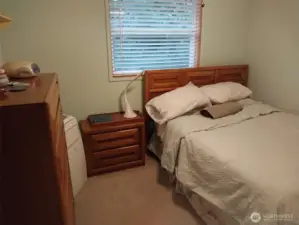 The smallest bedroom yet it's even big enough or a perfect office.