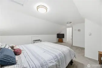 Spacious upstairs bedroom could be primary suite