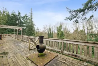 The large, expansive deck offers a perfect space for enjoying territorial views while providing plenty of room for entertaining and relaxed outdoor living.