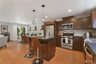 New pendant lighting and a pantry and built in desk.