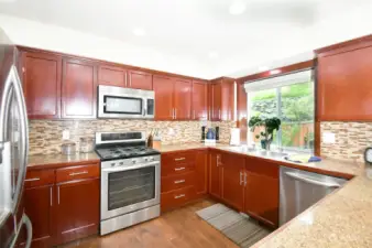 Kitchen opens to eating area and family room