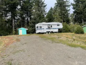 completely cleared lot with small storage shed