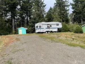 completely cleared lot with small storage shed