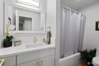 Full bathroom off the hallway with all new finishes!