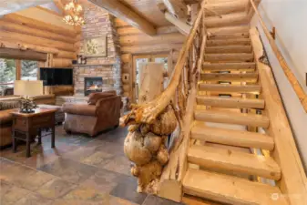 Custom railing built with wood found on the property.