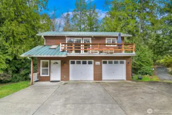 The ADU!  2 bedrooms and a full bathroom with deck and 2 car garage