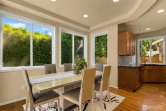 The dining space can accommodate a large gathering or an intimate dinner with views of the backyard.