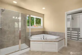 5-piece bath with tile countertop and soaker tub.