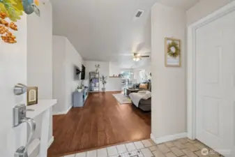 Enter home into a landing area with a bedroom off to the right.