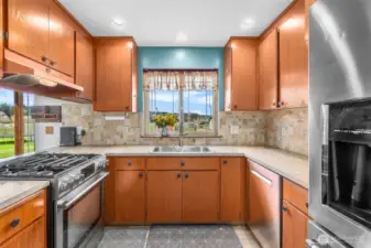 Propane gas stovetop with five burners makes cooking for others a little easier.