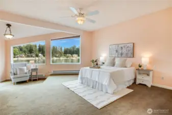 Upstairs, the primary suite offers sweeping bay vistas and its own private deck