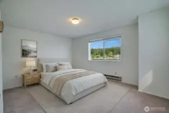 Bedroom 1 on 2 fl with a Bay view. Virtually staged.