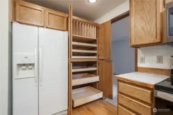 Slide out cabinet drawers and vertical storage slots!