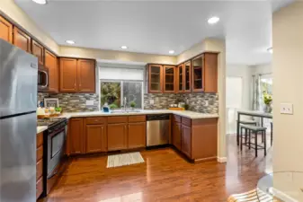 Stunning backsplash and ample cabinetry!