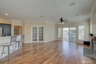French doors open to a versatile bedroom/office.