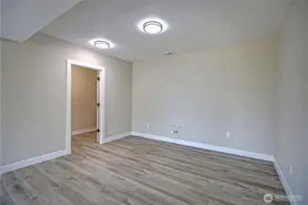 Large flex space pre-plumbed for kitchenette and bathroom