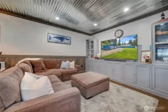 Cabinetry around the TV was made for this area and will stay with the home.