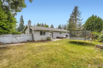 Fenced backyard adds privacy.