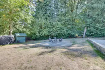 Firepit, well house, and 2,500 gallon water reserve tank