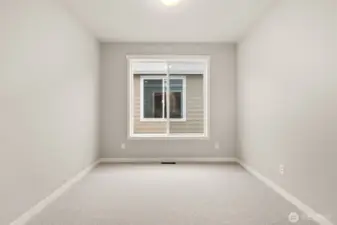 Double glass French doors lead to office/den in the heart of the main floor.
